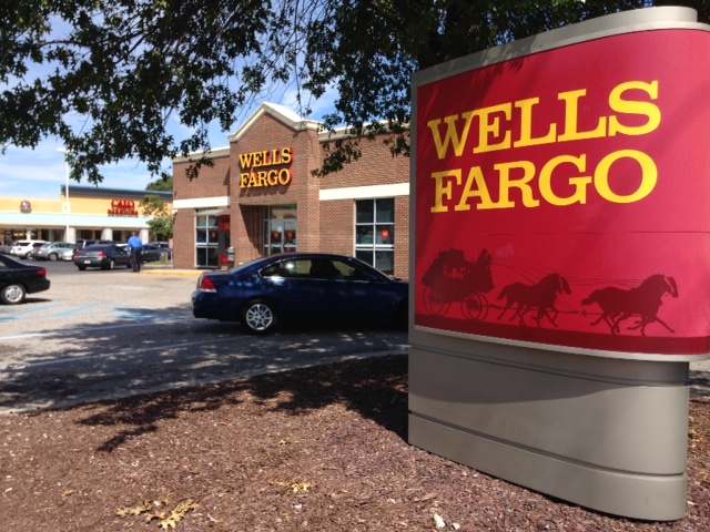 Wells Fargo cutting sales goal in wake of hefty fine